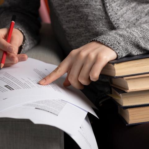 Image of a person reading a document